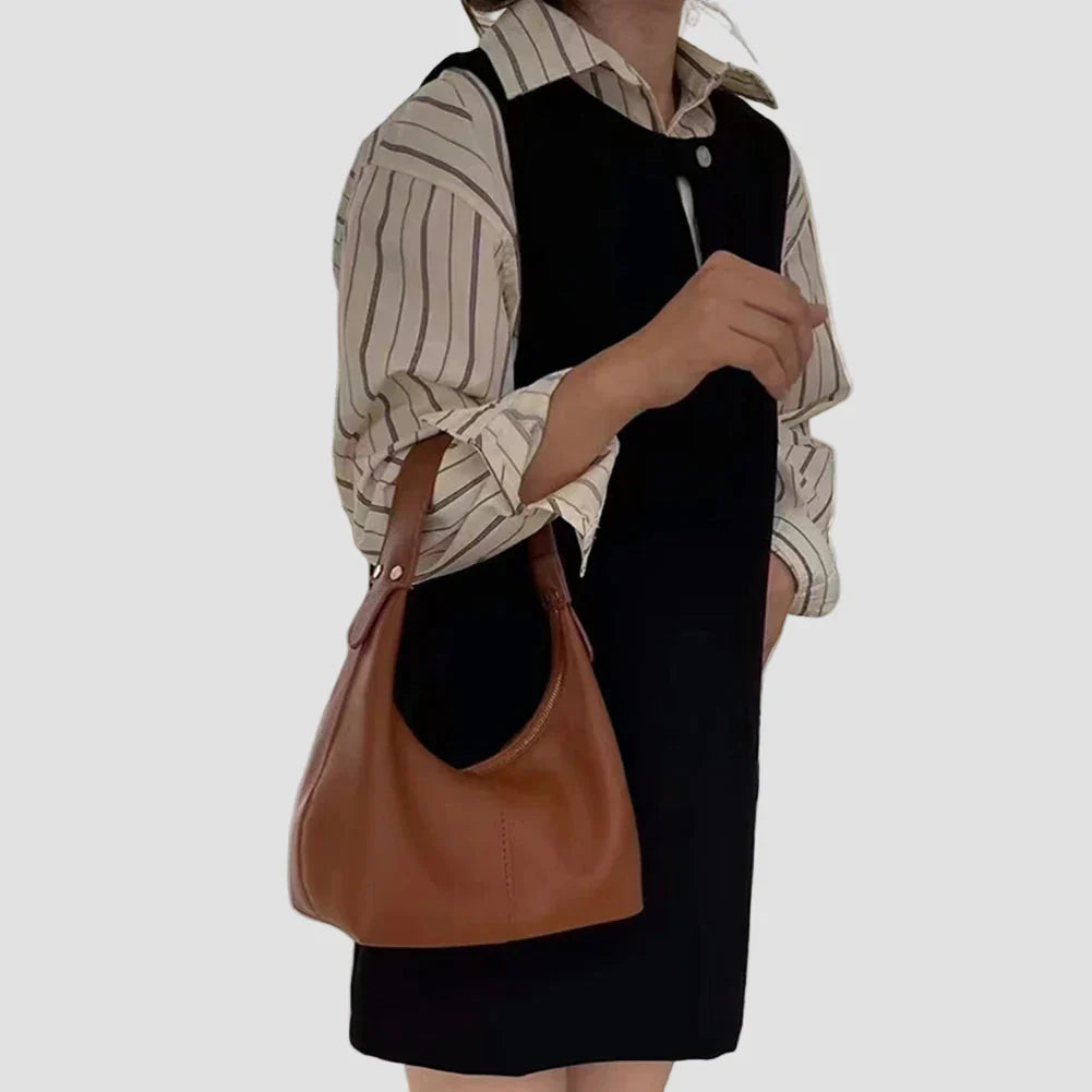 Ávi - Bolsa de Elegancia